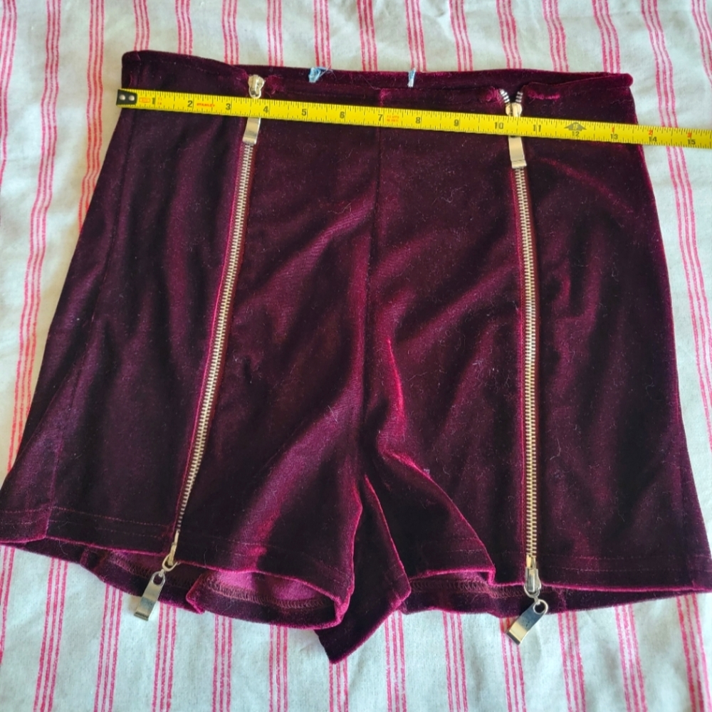 Medium high waist burgundy velvet shorts, zippers down the thighs